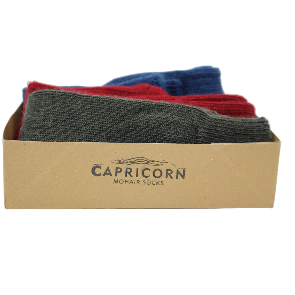 
                      
                        Gift-box of Capricorn mohair socks in various colours on a white background - a great present
                      
                    