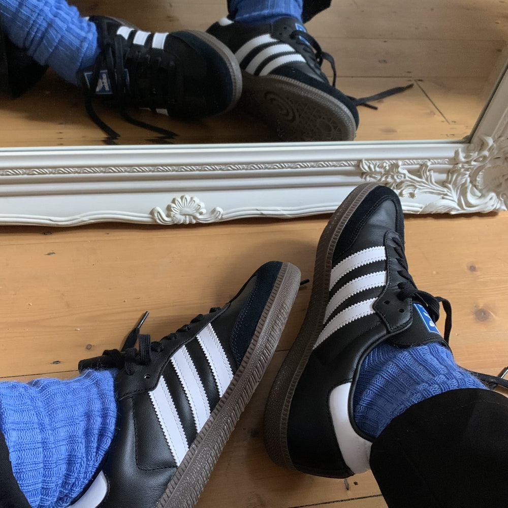 
                      
                        Mid-blue Sussex-style Capricorn Mohair Socks with textured knit, styled with Adidas trainers – everyday comfort with a classic twist
                      
                    